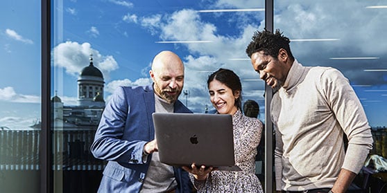 Three people working